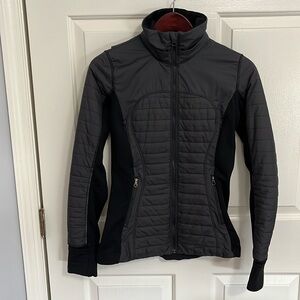 Lululemon Athletica short black front puffer jacket. Size 4 Beautiful detailing.